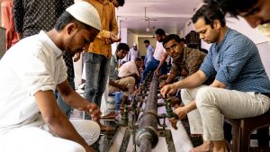 men performing ritual ablution in mosque